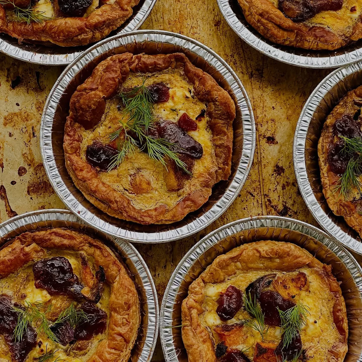 RAS-EL-HANOUT SQUASH AND QUINCE QUICHE

A golden, buttery quiche filled with roasted butternut squash and caramelized onions, studded with chunks of quince paste (membrillo) and crumbled feta.

The silky custard is infused with Ras el Hanout &mdash; 