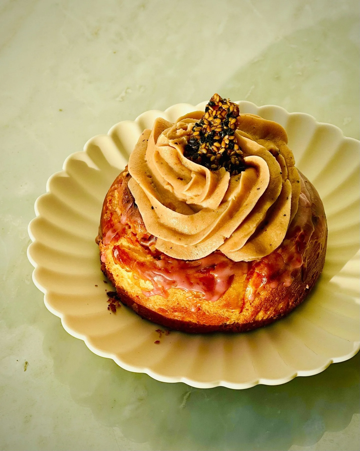 A soft detour from tradition &mdash; and part of the UFS 3rd Anniversary Box. ✨

Tender milk buns, perfumed with freshly ground green cardamom. Filled with halva &mdash; that deeply nutty, sesame-sweet Middle Eastern fudge &mdash; and finished with a