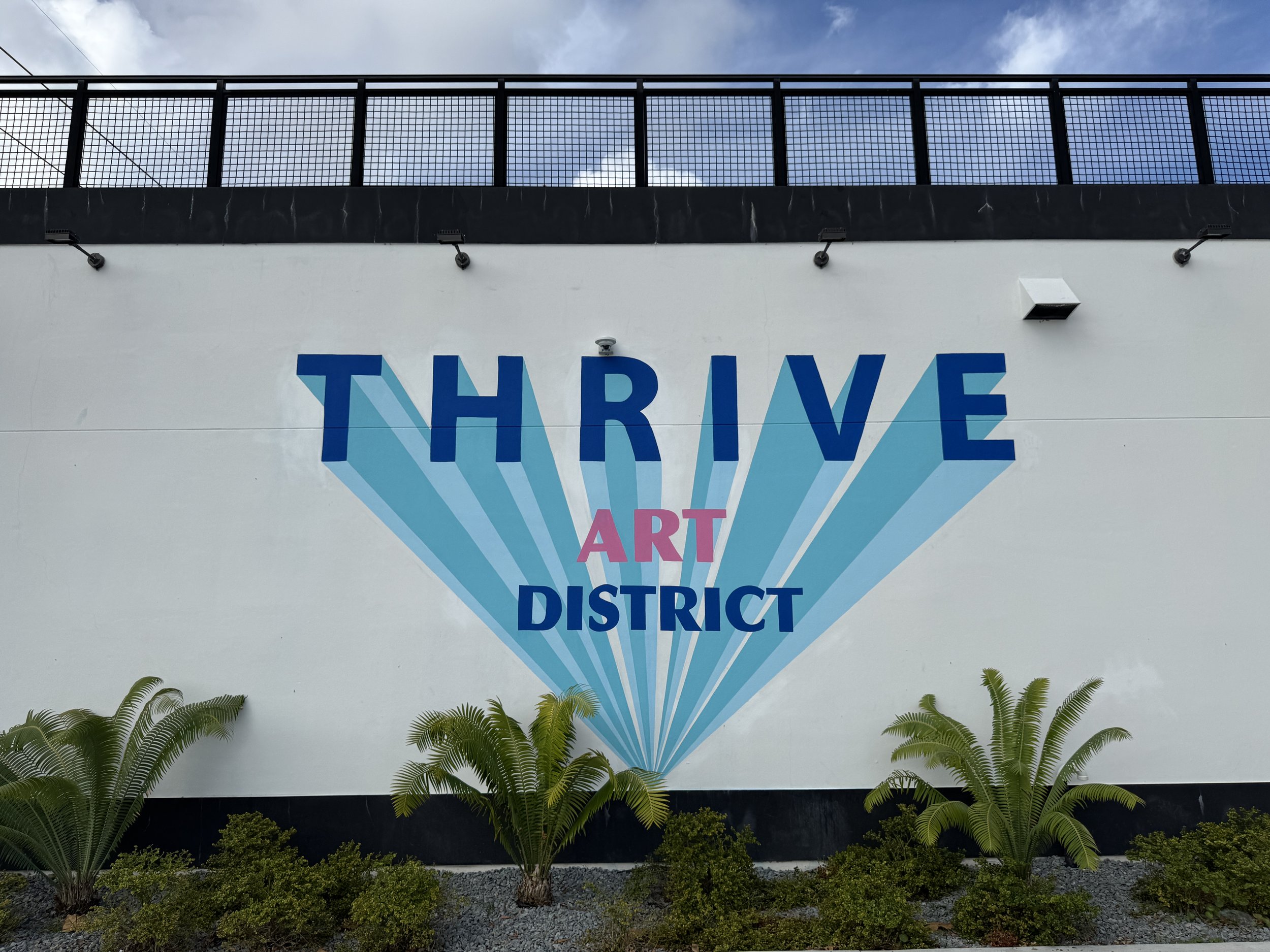 Thrive Art District logo mural in Fort Lauderdale, Florida
