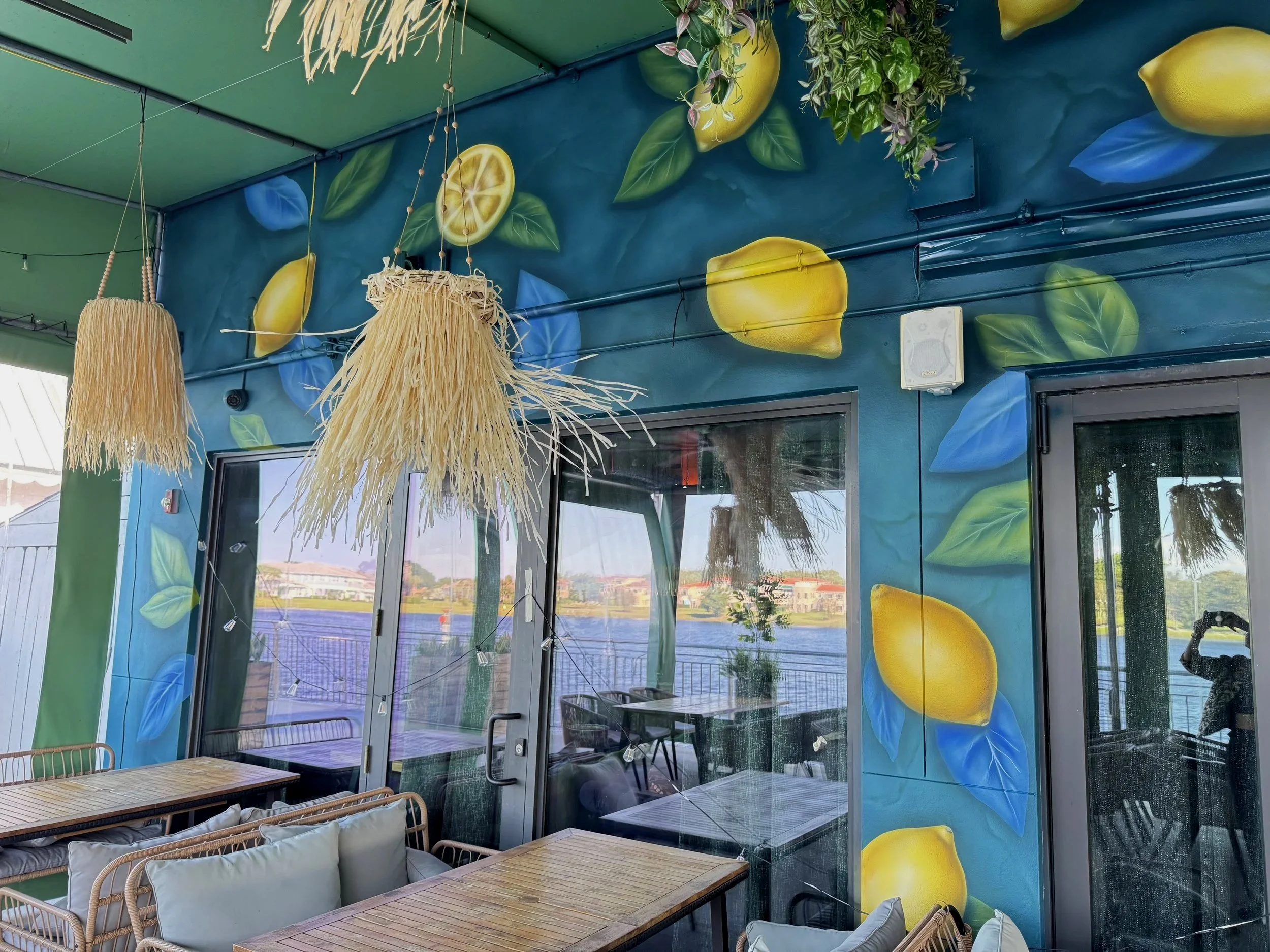 Custom lemon and botanical mural for an outdoor dining space