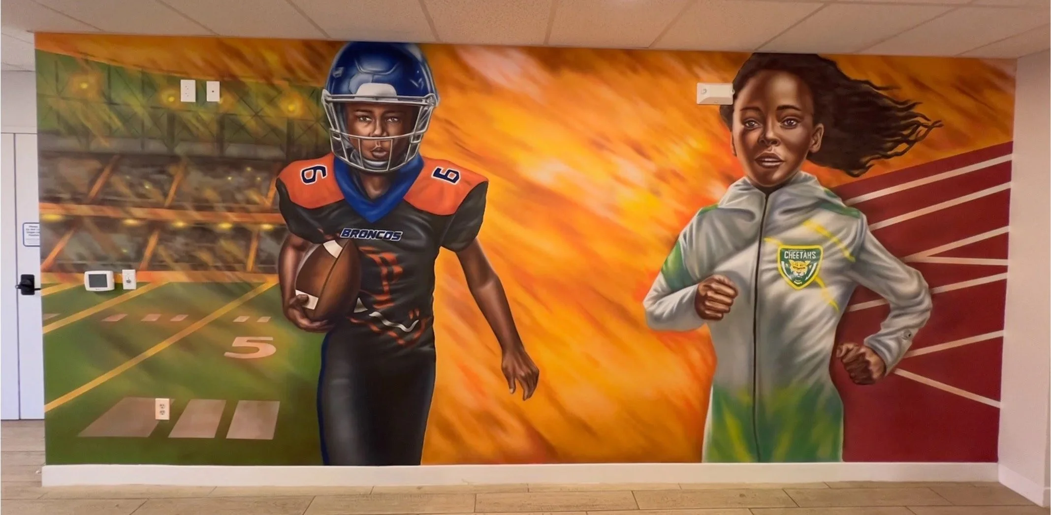 Youth sports mural with young football and track athletes