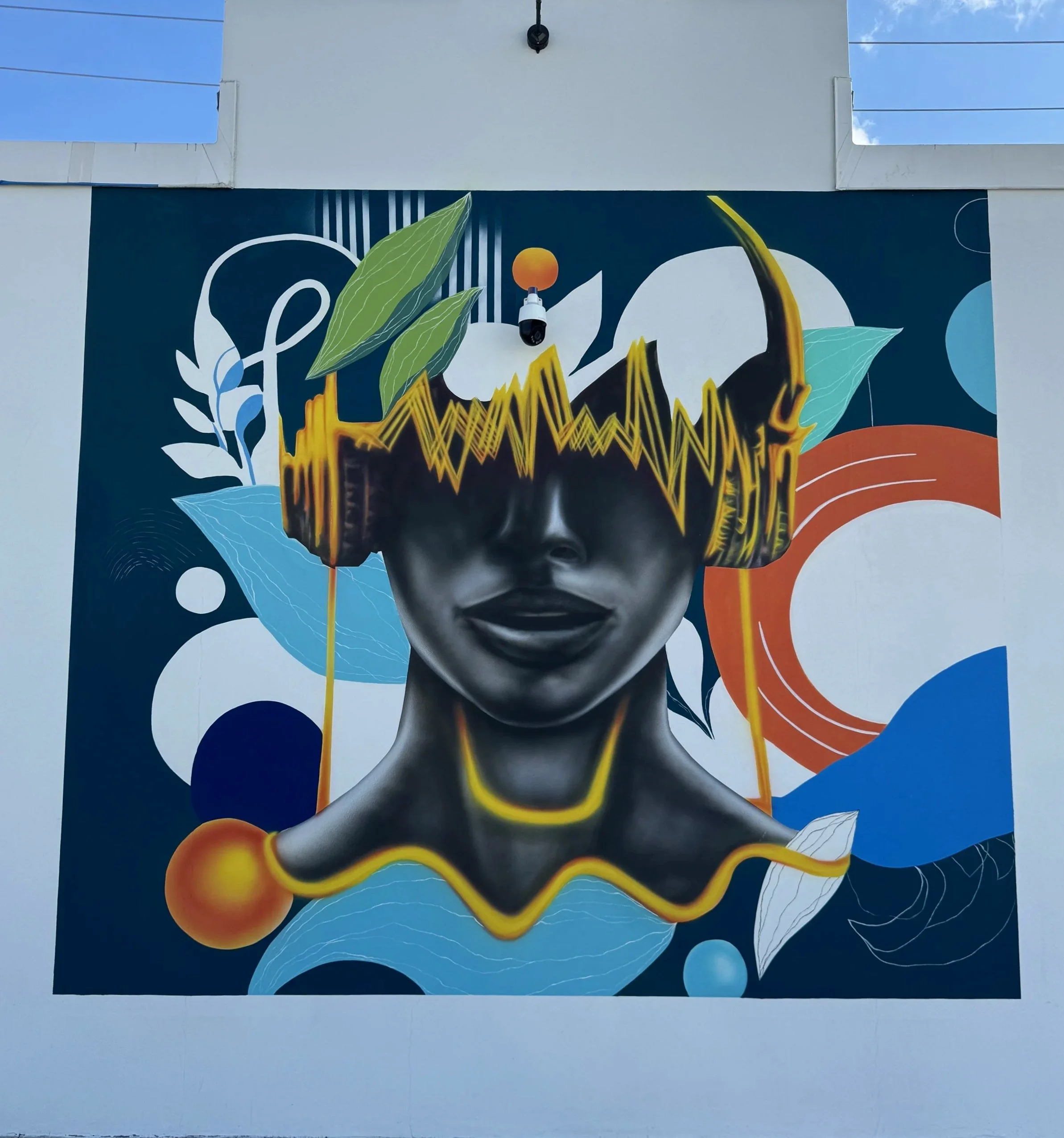 Full view of the 12 by 12 foot Modern Harmony public art mural at Thrive Art District