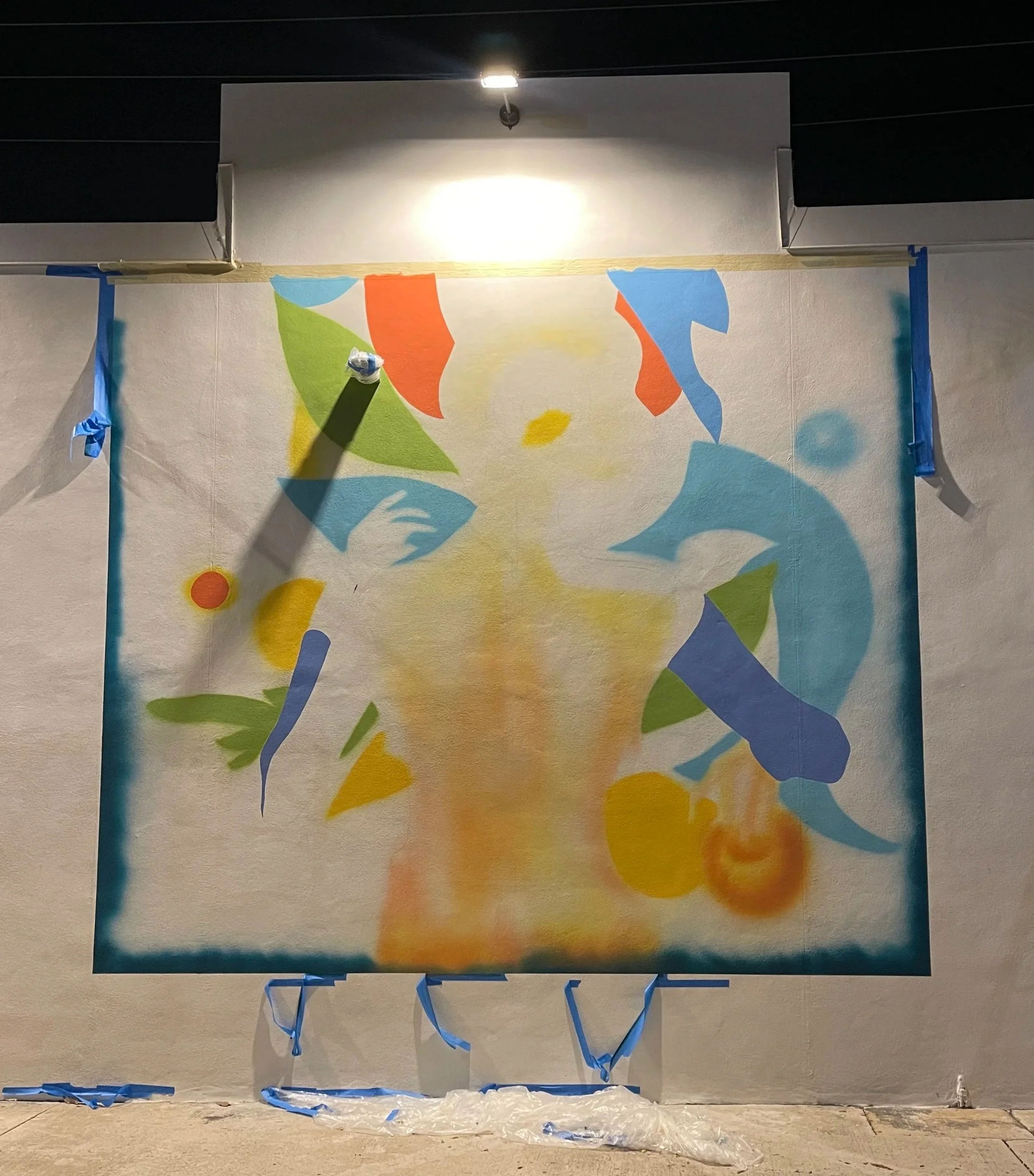 Early painting stage with abstract color blocks mapped onto the Timeless Fusion mural wall