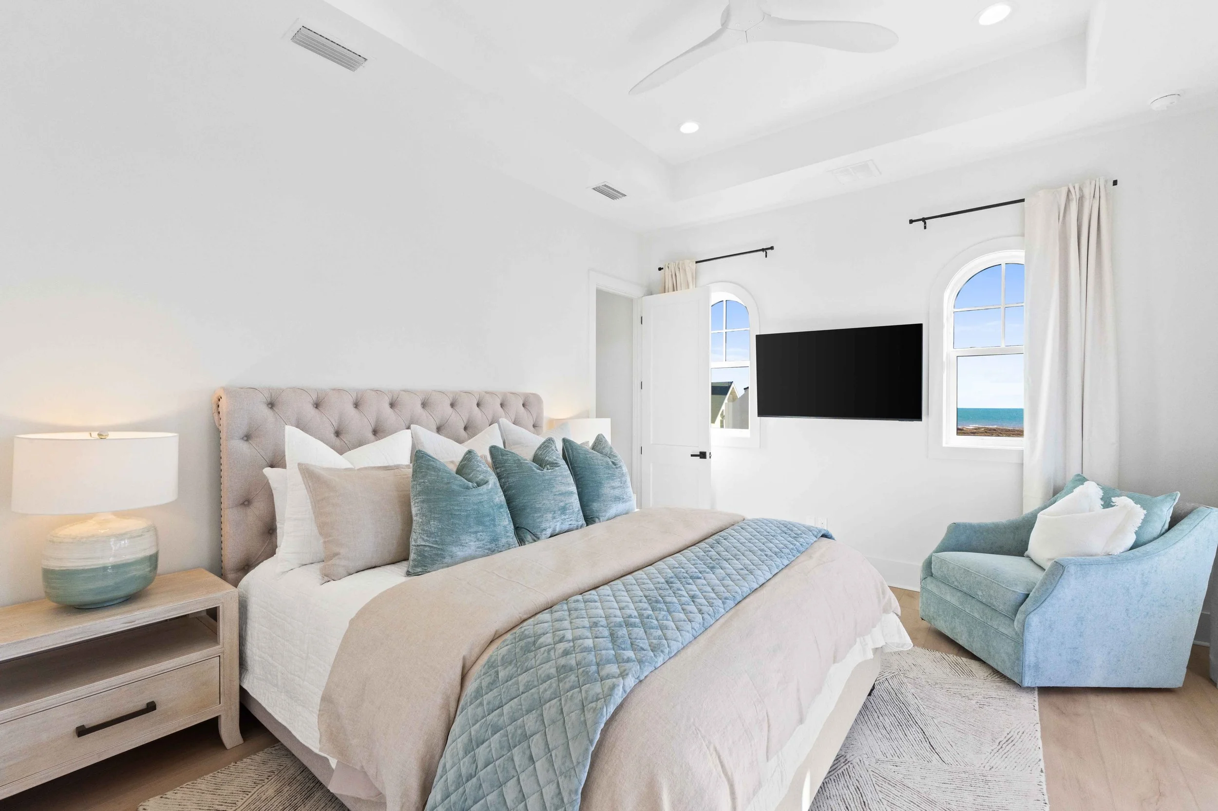 Photo of a bedroom located in a rental property, with ocean views 