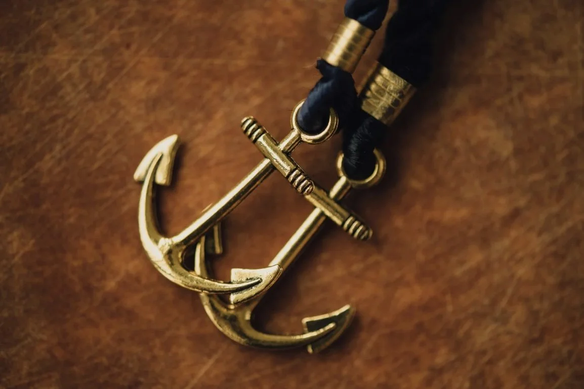 Gold anchor symbol representing stepping into your destiny through spiritual consciousness alignment and repeating life pattern transformation — Life in Synergy®