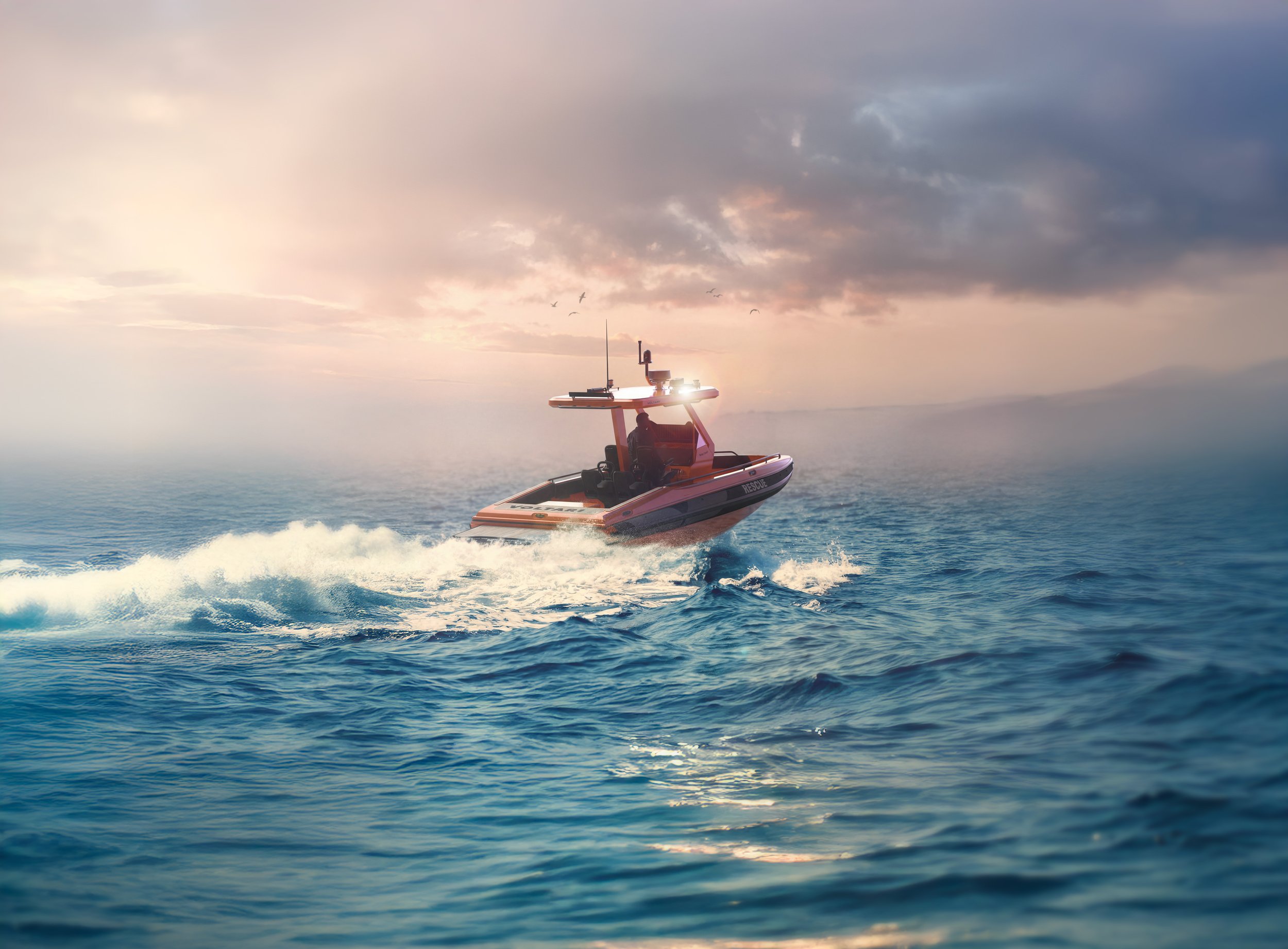 A rescue boat moving across the ocean at sunset
