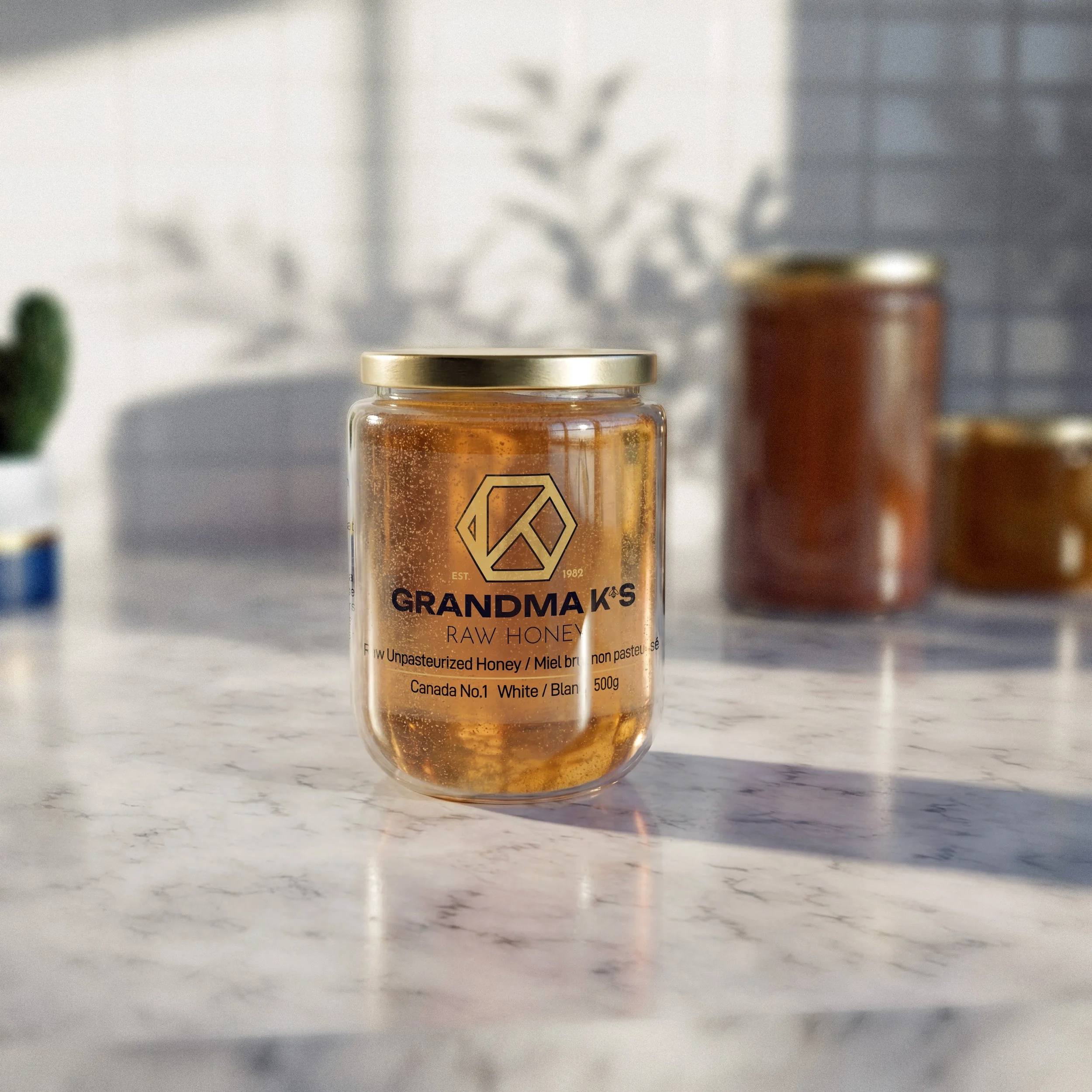 Product render of glass jar of liquid honey from Grandma K's Raw honey. The jar is on a marble kitchen counter with soft sunlight and shadows