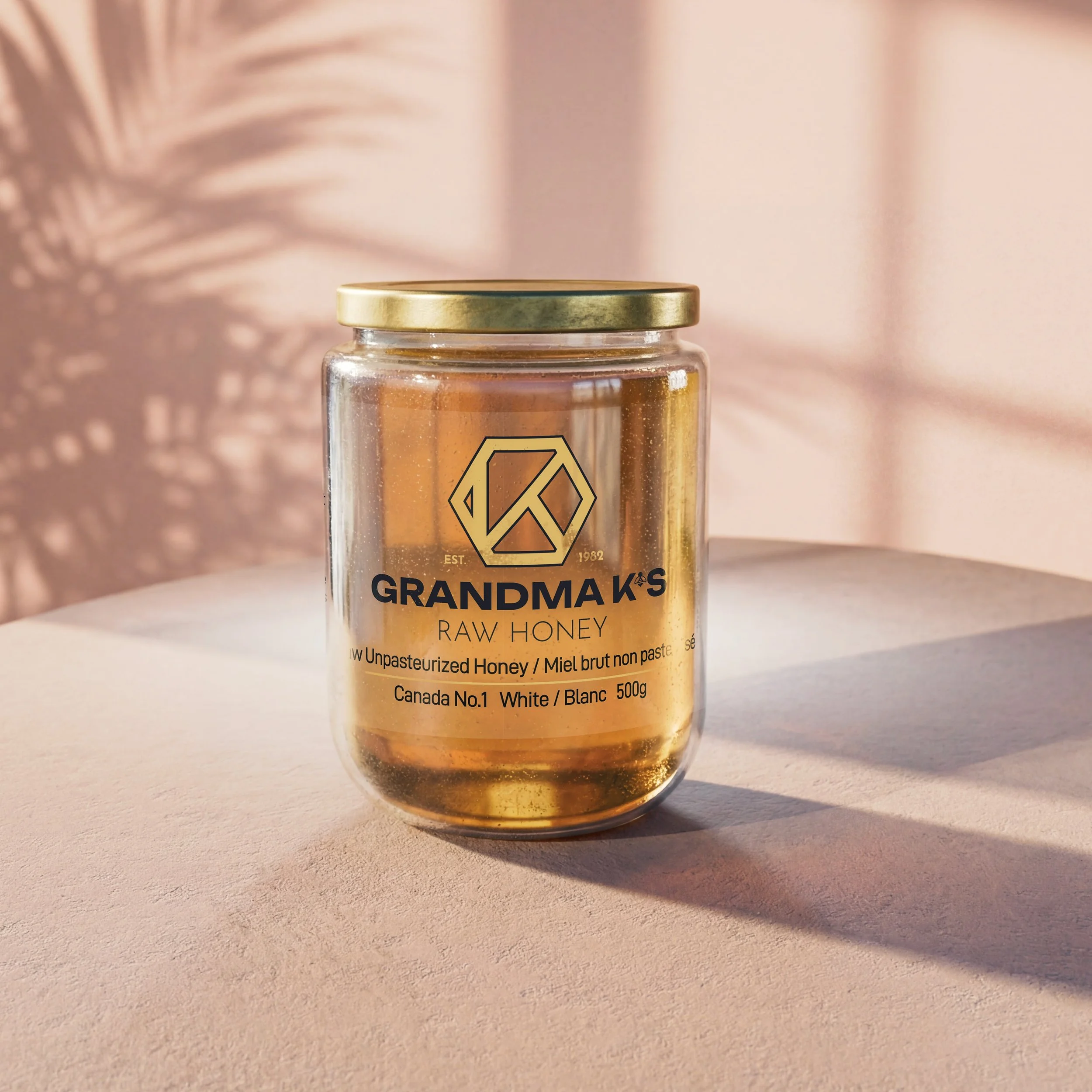 Product render of glass jar of liquid honey from Grandma K's Raw honey