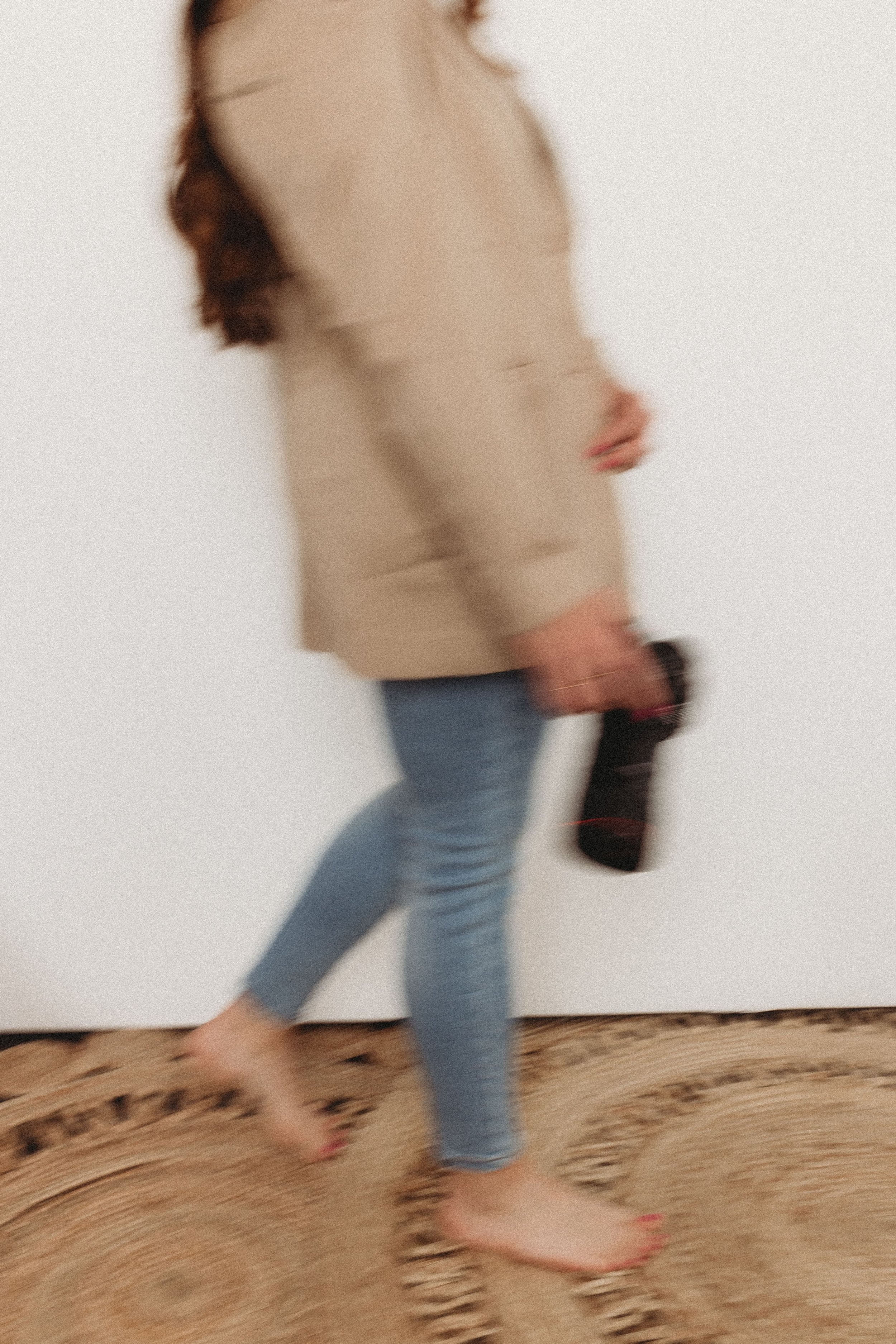  a motion blur shot of hannah with her camera 