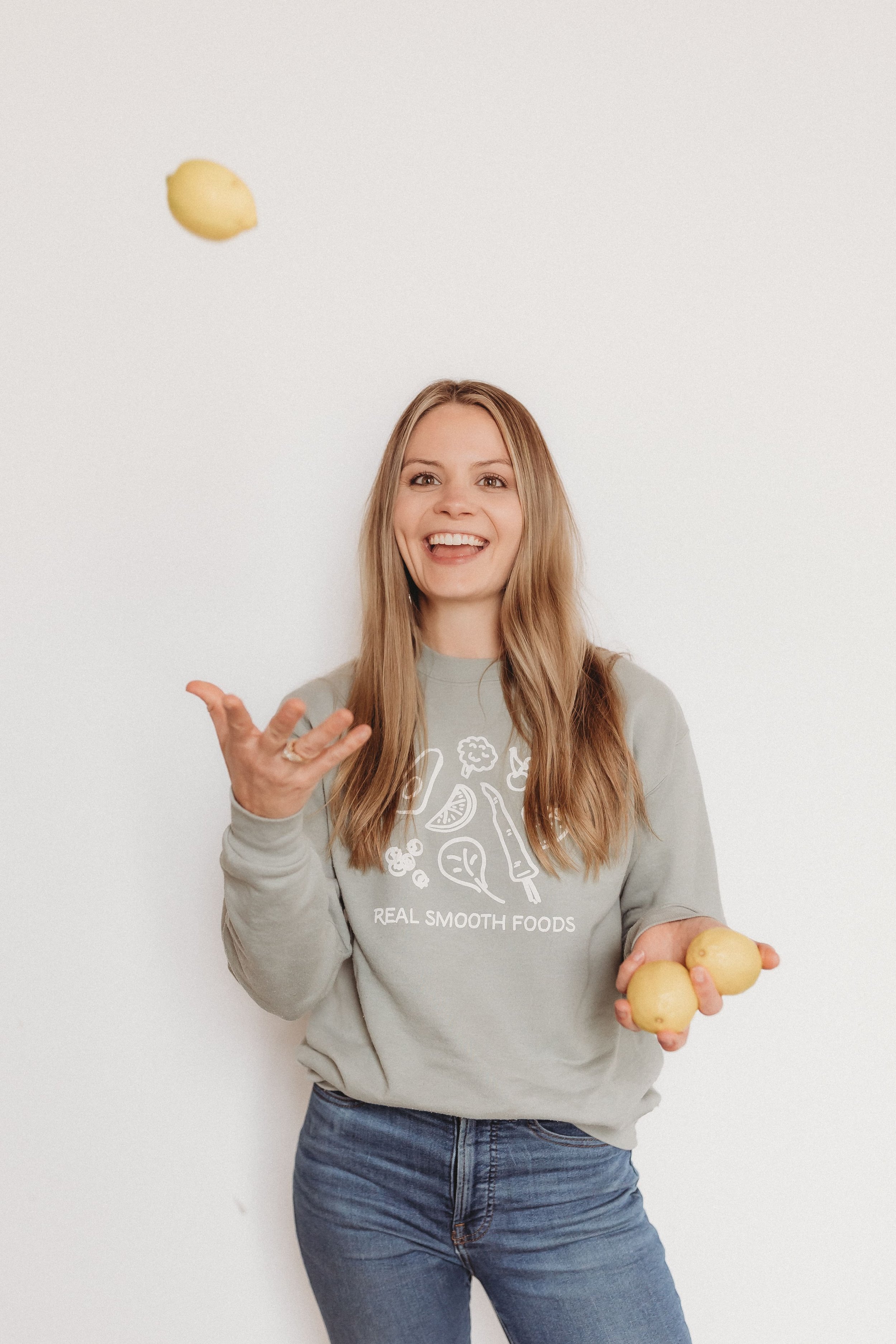  bri throws lemons in the air during her photoshoot 