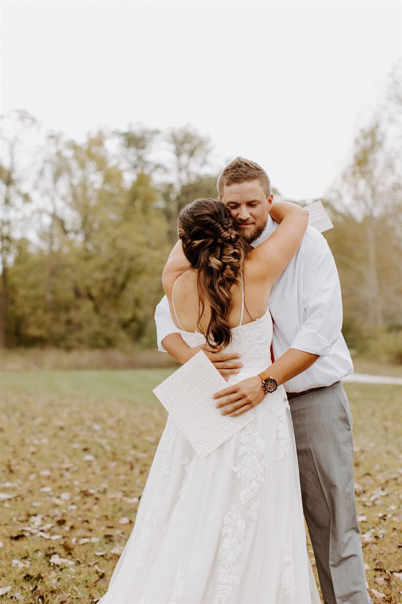  wedding recap, hannah and lance share a hug during their private vows 