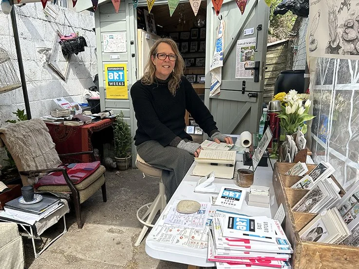 artweeks desk smiling lo res cropped.jpg
