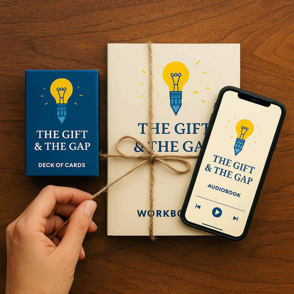 A gift set titled 'The Gift & The Gap' includes a deck of cards, a workbook wrapped with a string, and an audiobook on a smartphone, all featuring a lightbulb logo with a pencil filament on a wooden surface.