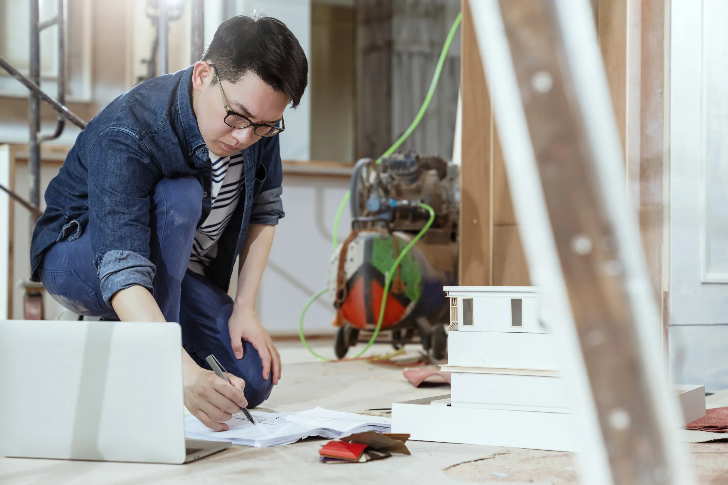Architect working on floor