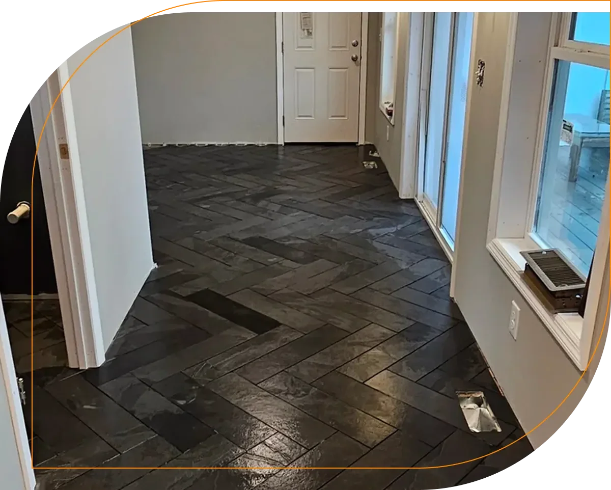 Dark herringbone tile floor