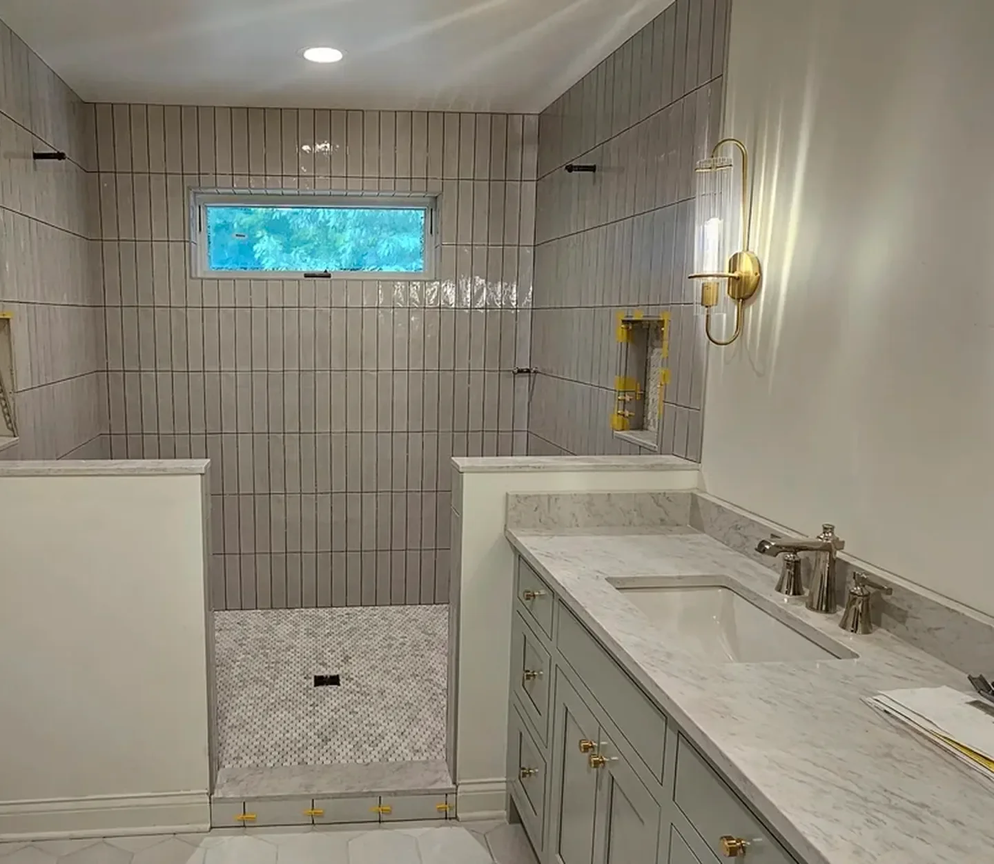 Bathroom renovation with marble vanity