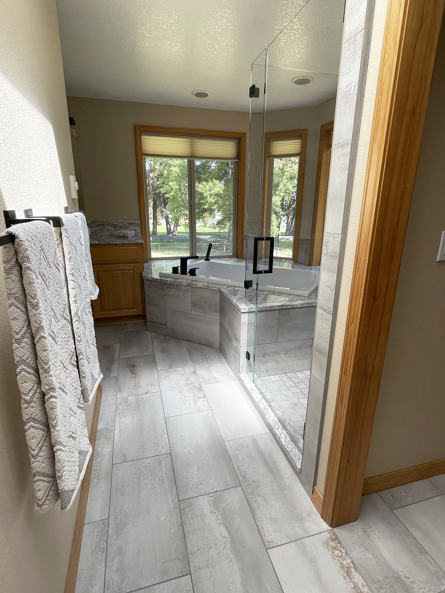 AFTER: Primary—Tub & Shower, Hall View