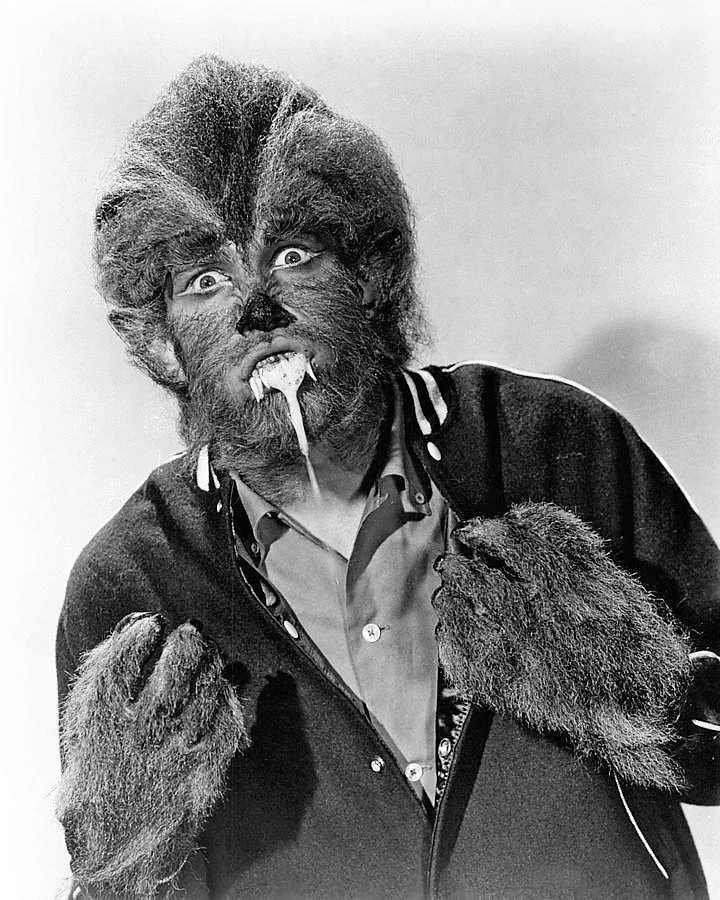 Black and white photo of a teenage werewolf foaming at the mouth
