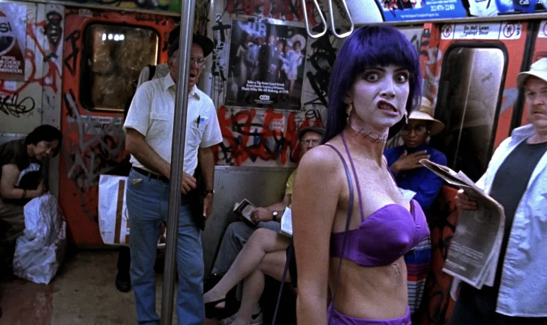 Still from Frankenhooker in which the creature rides the subway