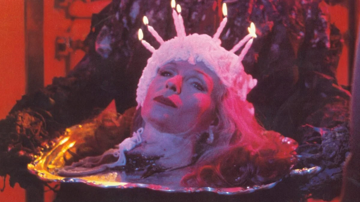 A head dressed as a cake on a platter in the movie Creepshow