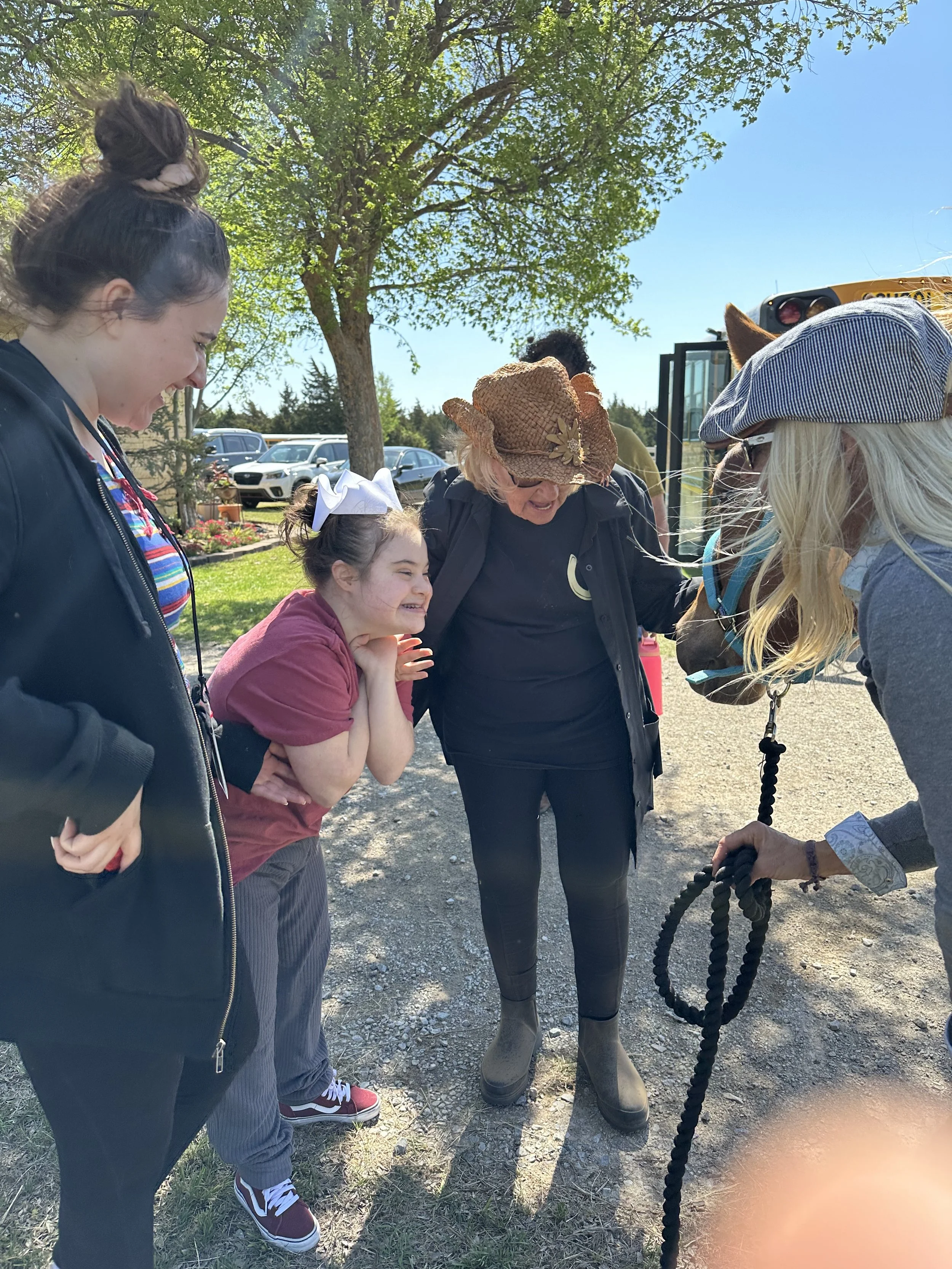 down sydrome girl happy with prim.jpeg