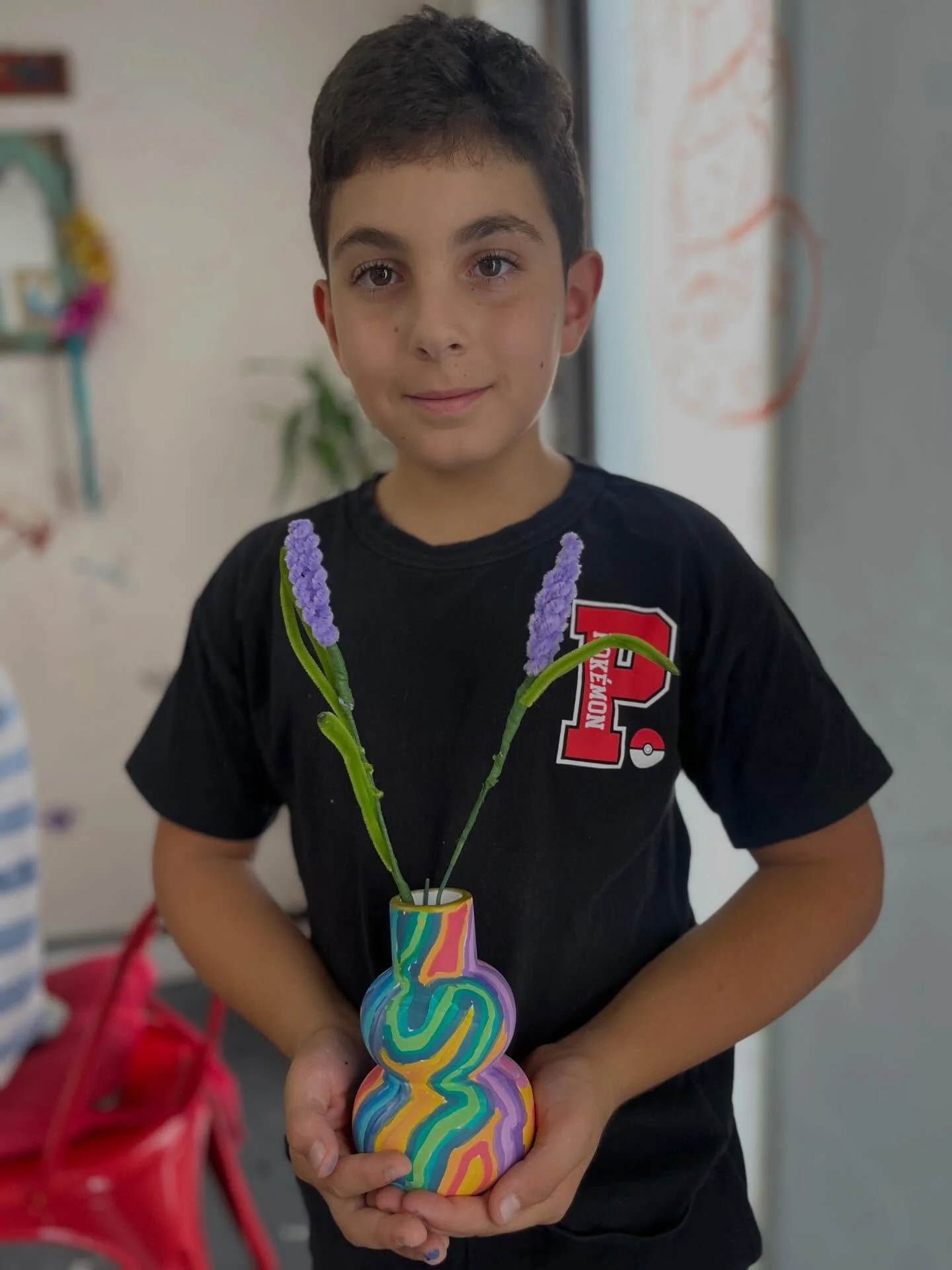 We scribbled down all the things we love and turned them into the cutest little bud vases&mdash;each one totally unique and bursting with personality! We jazzed them up with some wiggly, colorful pipe cleaner flowers ( a bit tricky but we got there w