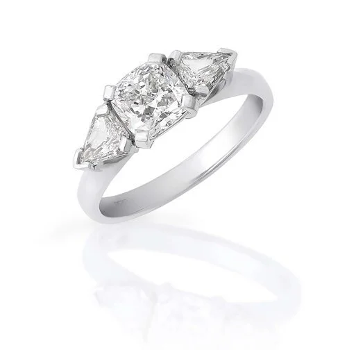 A White gold ring with a large central diamond flanked by two smaller diamonds on each side.