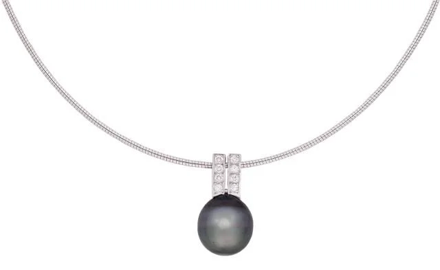 A necklace with a black pearl pendant and a White gold chain.