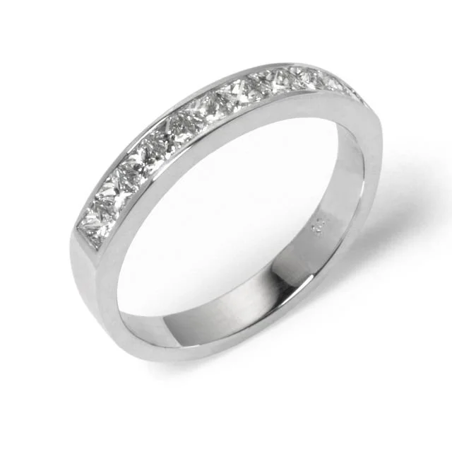 White gold ring with embedded clear gemstones in a row.