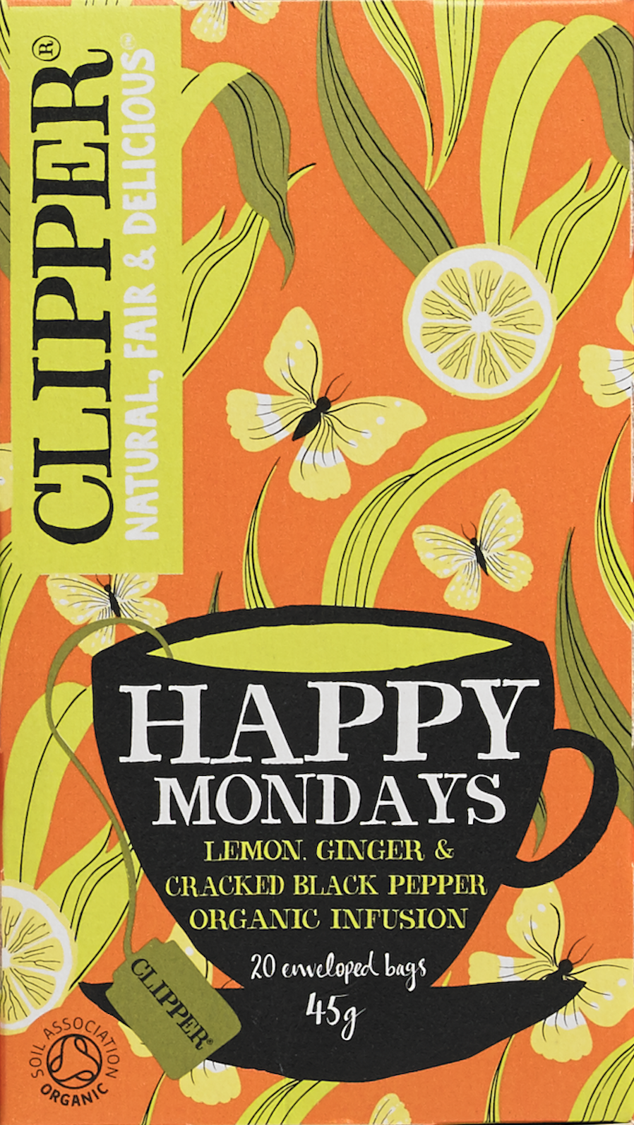 A vibrant tea packaging with an orange background decorated with illustrations of lemon slices, butterflies, and green leaves. The label reads "CUPPERR NATURAL, FAIR & DELICIOUS" and features a black mug illustration with "HAPPY MONDAYS" and flavor d
