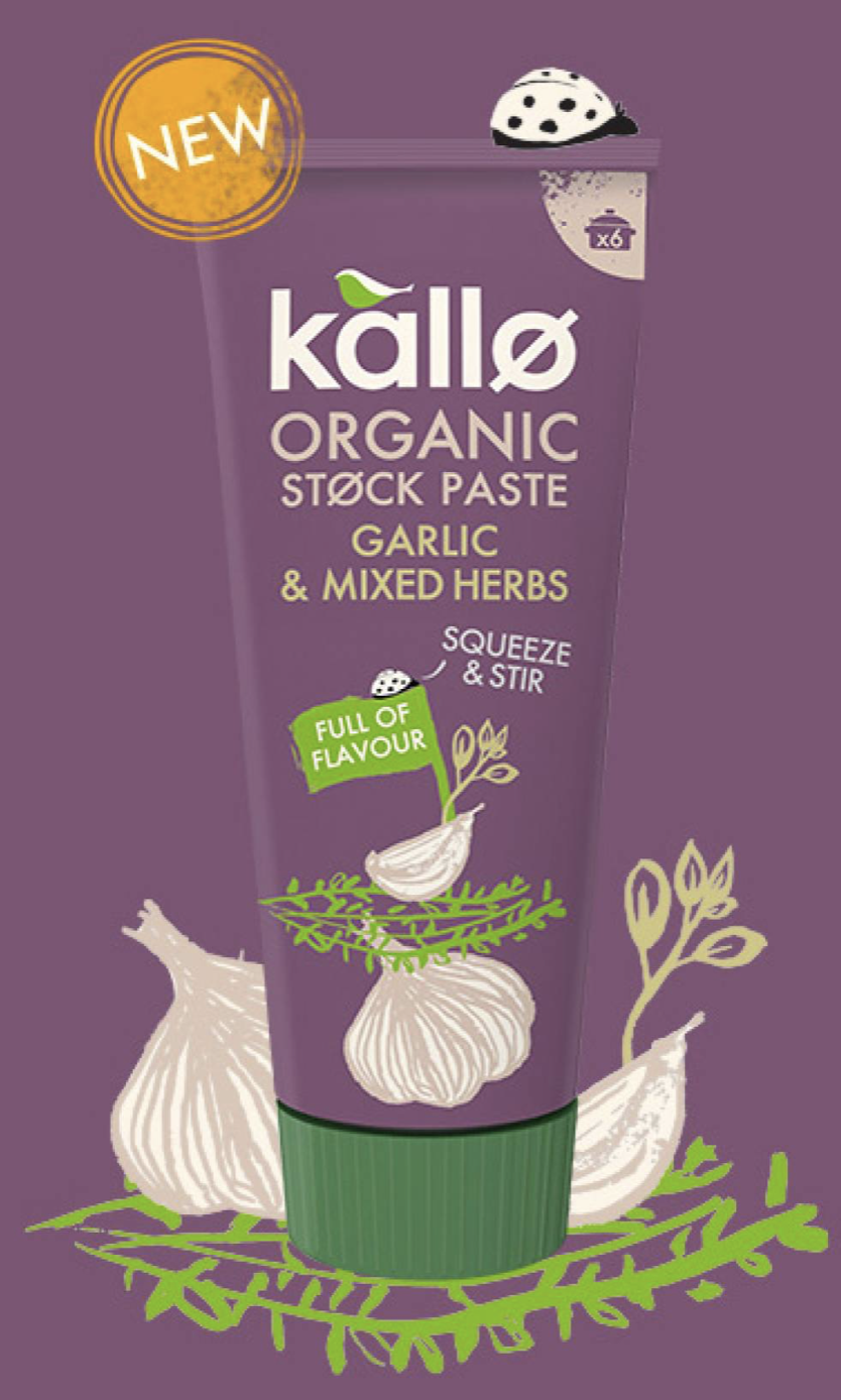 A tube of Kallo organic stock paste with garlic and mixed herbs, featuring illustrations of garlic bulbs, herbs, and a ladybird on a purple background.