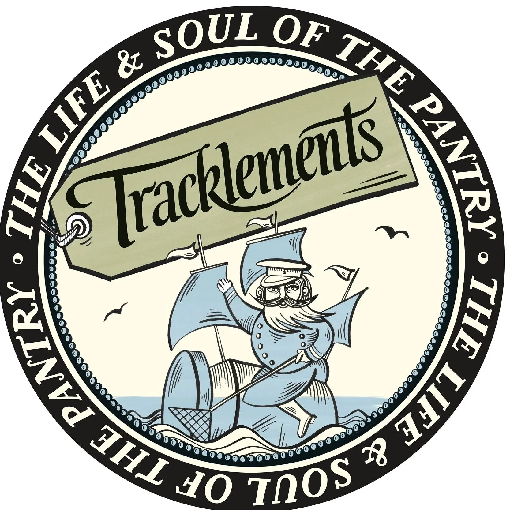 Vintage-style logo featuring a sailor with a beard and mustache, standing on a boat, holding a large sign that says 'Tracklements'. Circular border with the text 'The life & soul of the party & the salt of the earth & the reason for the season' surro