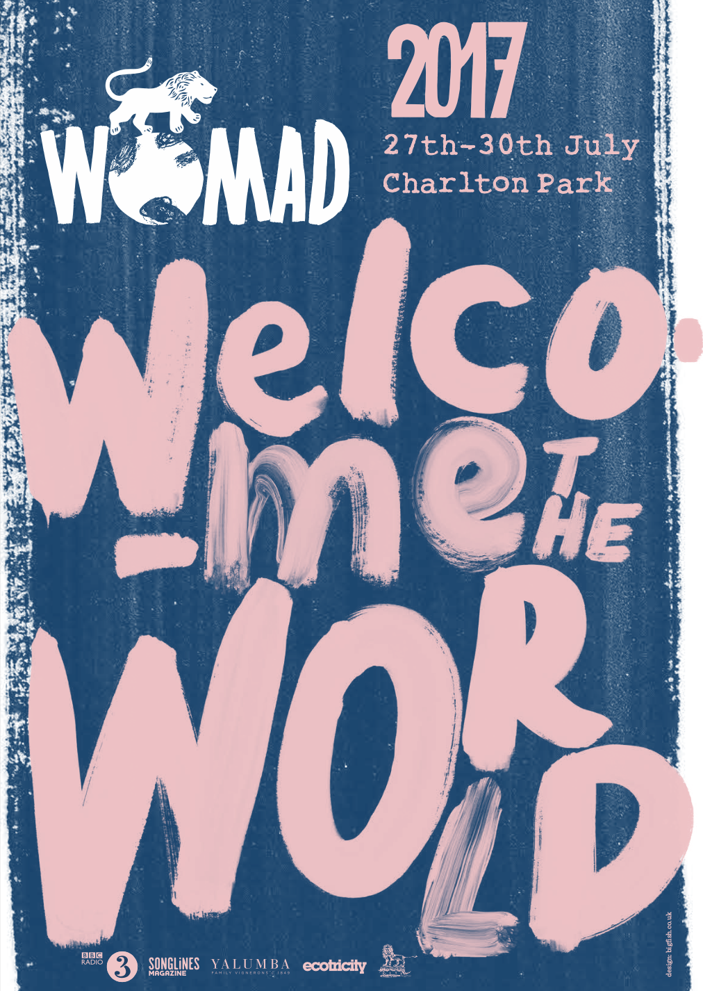 Poster for WOMAD festival 2017, held from July 27th to July 30th at Charlton Park. Features a white lion on top of a globe and pink text on a blue background reading 'WOMAD Welcome the World'.