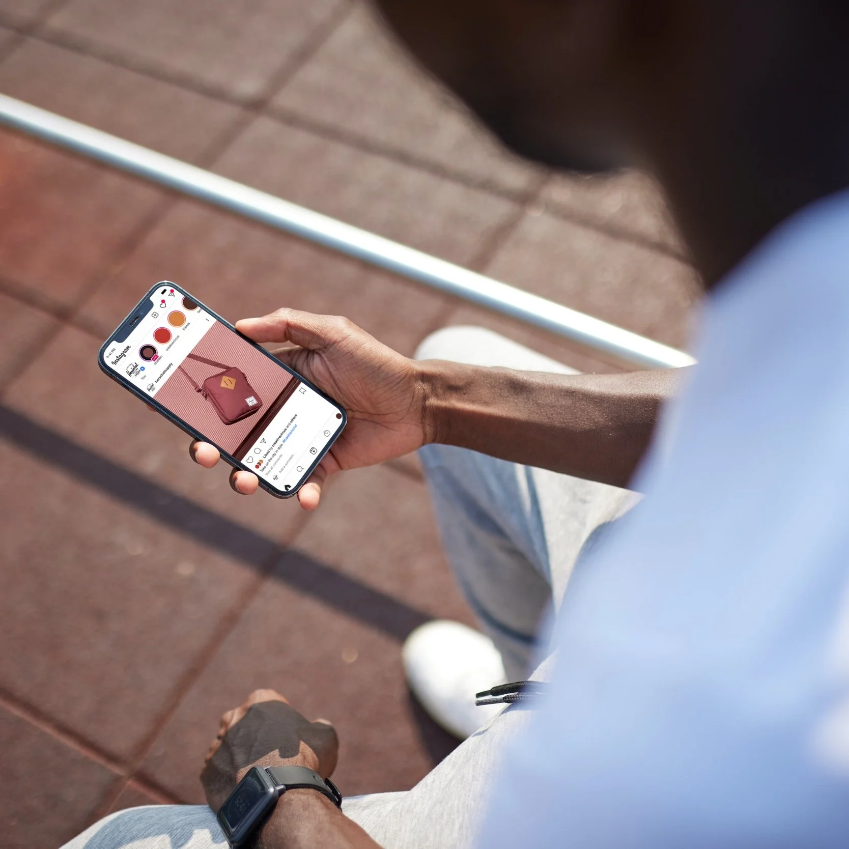 African-American+man+using+iPhone+12+Pro_HerschelIGFeed.jpg