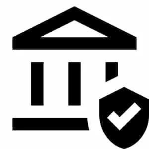 A black and white symbol of a government building with a shield containing a checkmark in front of it.