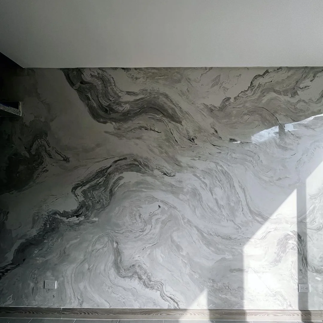 Wall with gray and white marble texture design