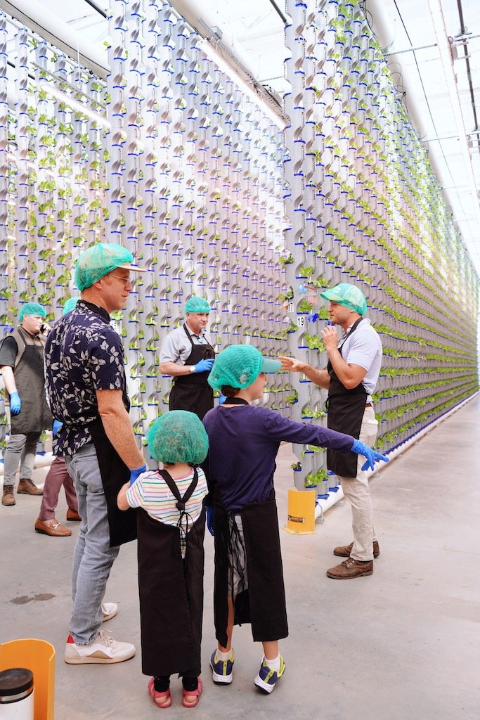kids and their dad on a vertical farming tour at eden green technology.jpg