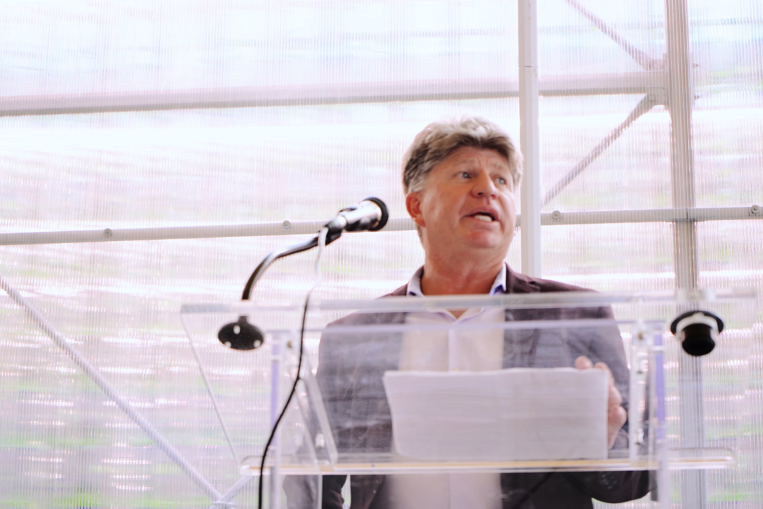 jacques van buuren at eden green technology vertical greenhouse opening.jpg