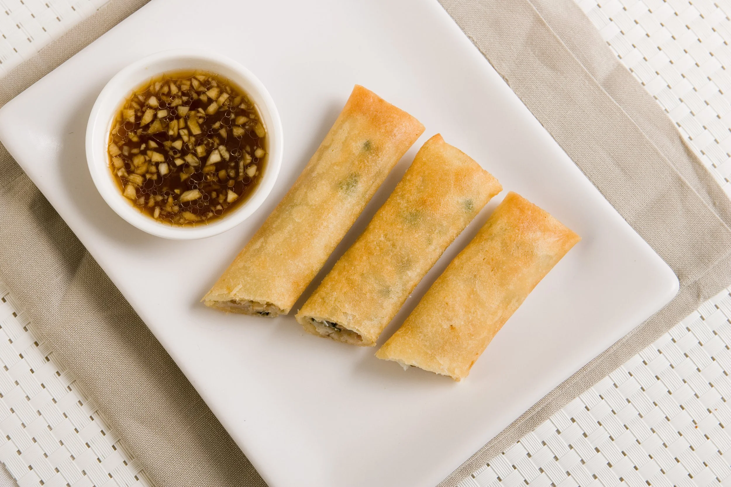Spring roll stuffed with crabmeat, halibut and shrimp