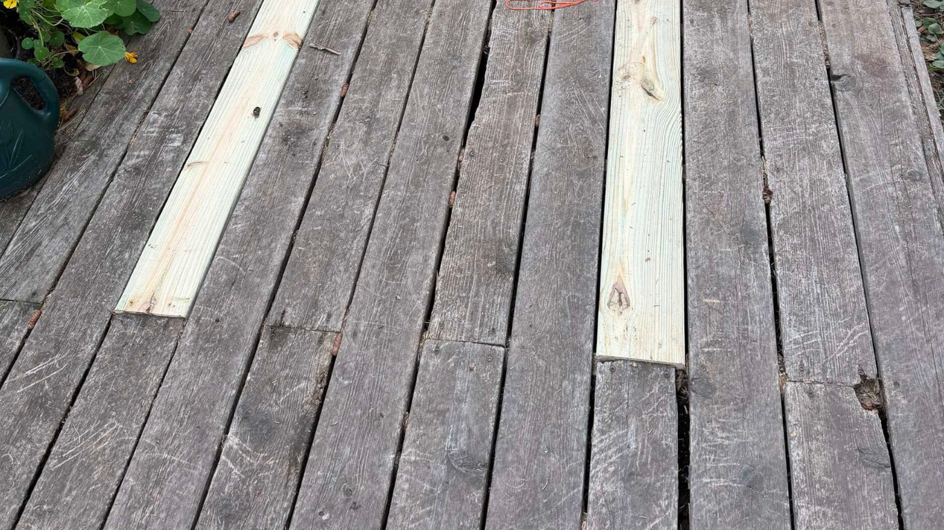 A deteriorating deck with patches