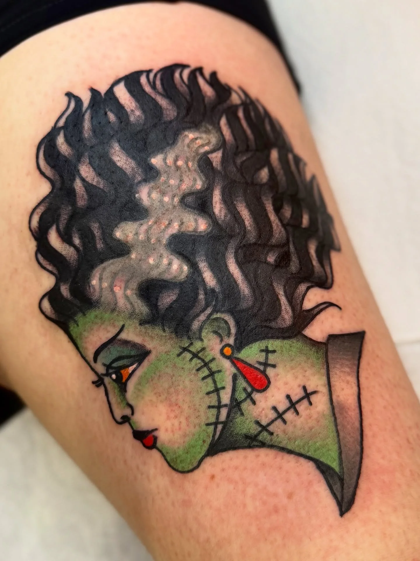 bride of Frankenstein head off of my flash for Jen 🧟&zwj;♀️🔌⚡️ thank you so much for your trust with this one! It was such an honor to tattoo you! I hope it heals up well for you! 

I&rsquo;ve been loving tattooing all the spooky/halloween flash ✨?