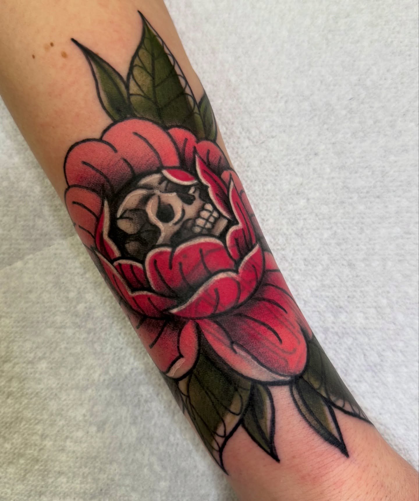 peony skull as a coverup/blastover for sky yesterday 💀🌸 swipe to see what we started with ✨ thank you so much for your trust with this one! it was so lovely to meet and tattoo you, I can&rsquo;t wait to see how this one heals up! 

I take on coveru