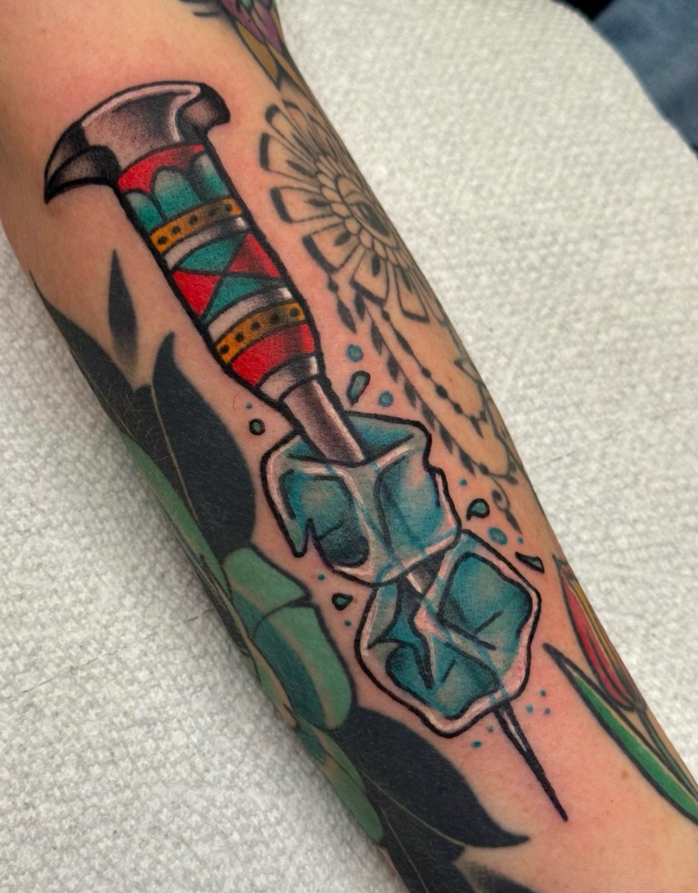 the first of many fuck ice tattoos to come 🧊🔥⛏️ thank you Heather for your trust with this one! surrounding tattoos not by me

this one is off of my fuck ice flash sheet I posted last week &mdash; 50% of all proceeds from these designs will go towa