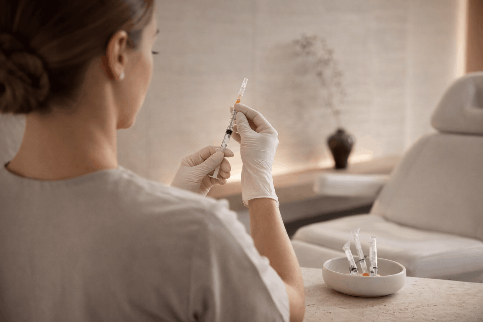 Woman receiving Botox treatment while considering med spa vs dermatologist options.