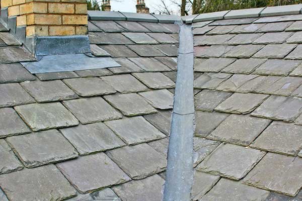 new-replacment-roof-using-welsh-reclaimed-slates-new-lead-vallets-and-lead-flashings-to-the-chimney-stack.jpg