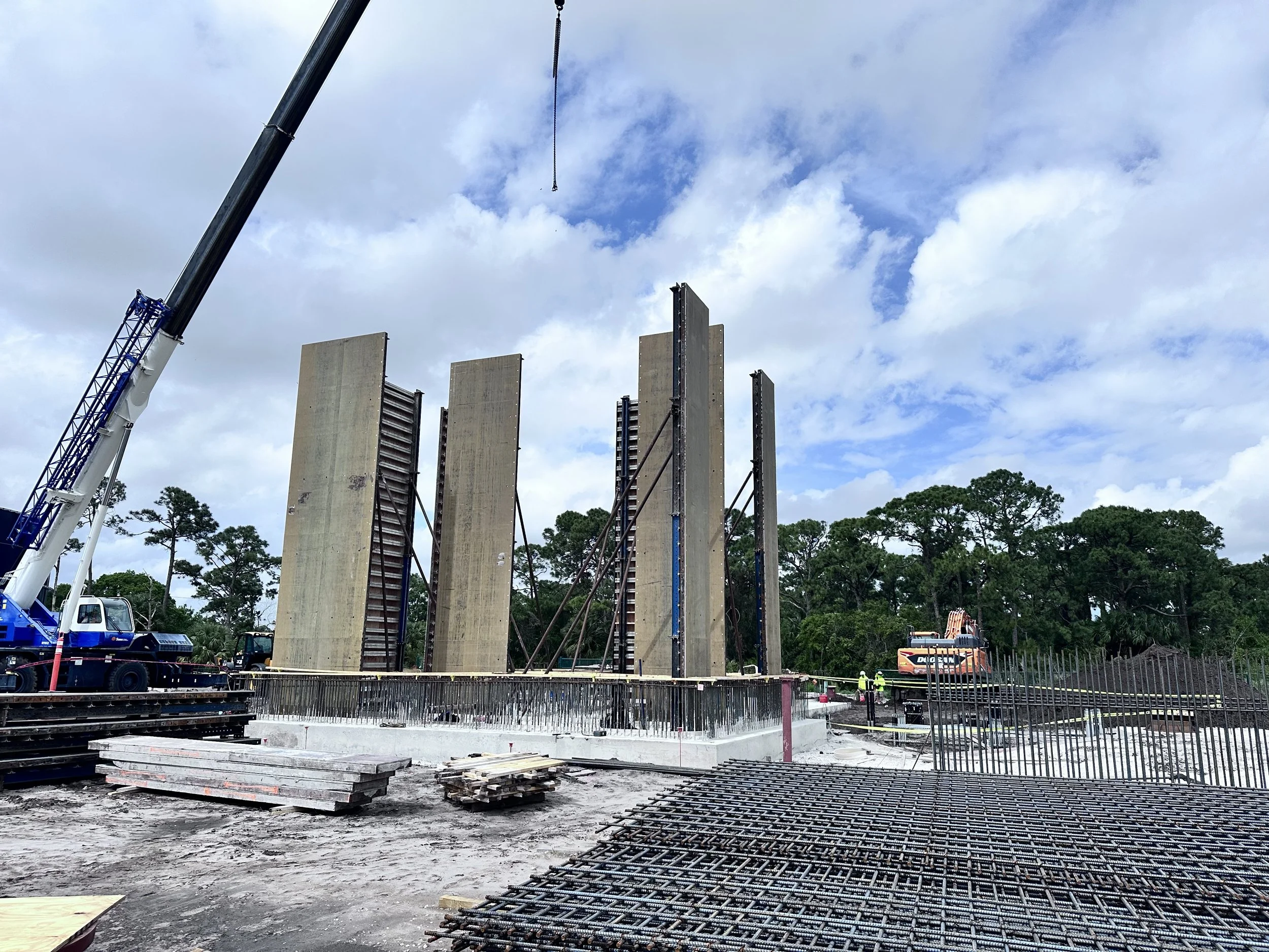 Masonry walls at main electrical building steadily rising