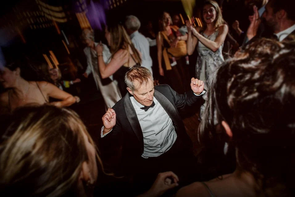 Groove Approved Los Angeles wedding DJ packed dance floor with father of the groom celebrating surrounded by guests
