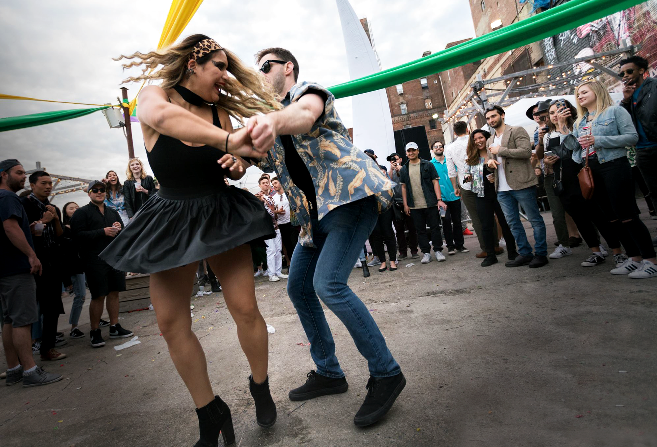 Couple dancing at an outdoor private event with live music and Groove Approved entertainment.