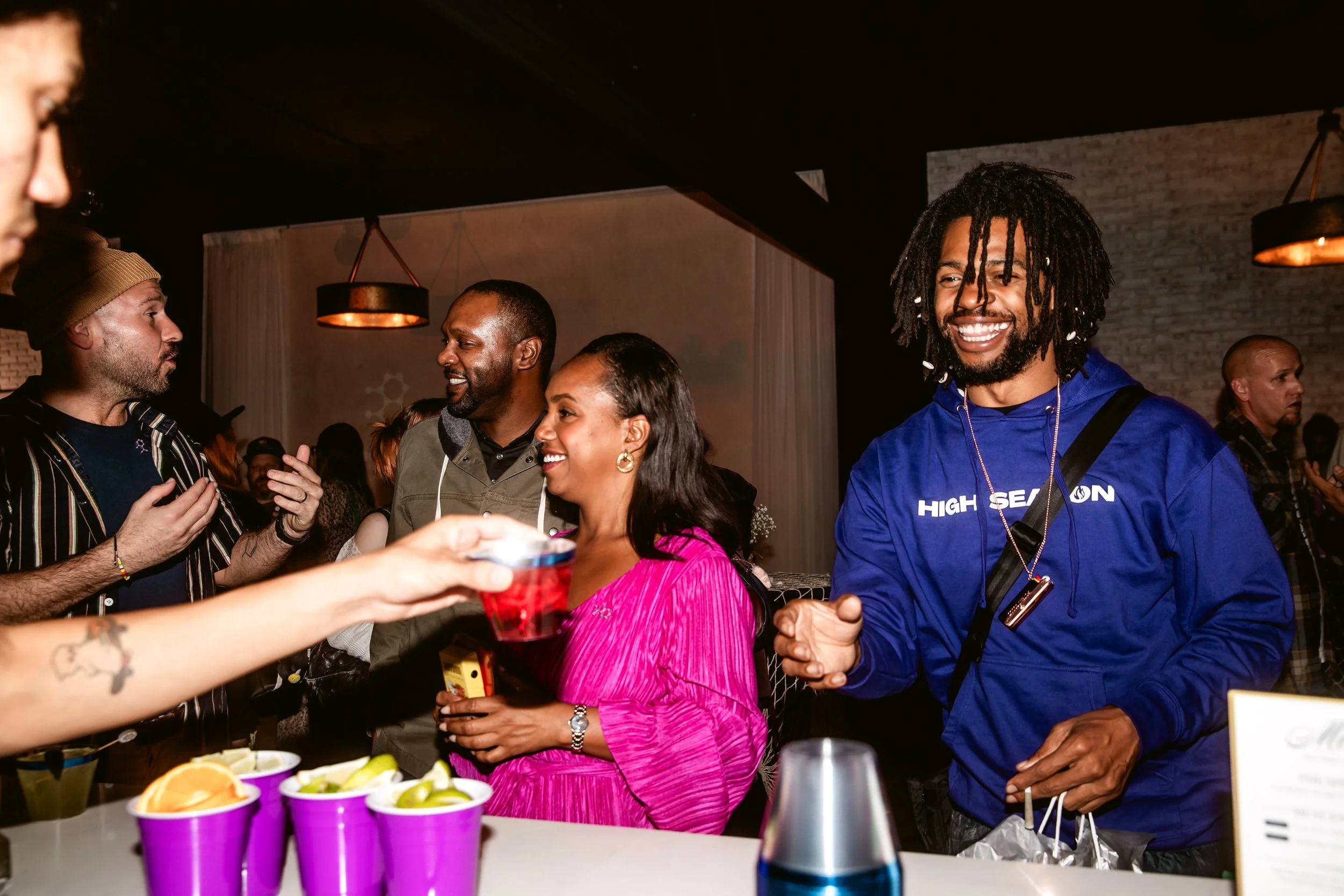Guests enjoying cocktail hour and socializing during a private event with Groove Approved DJ entertainment.