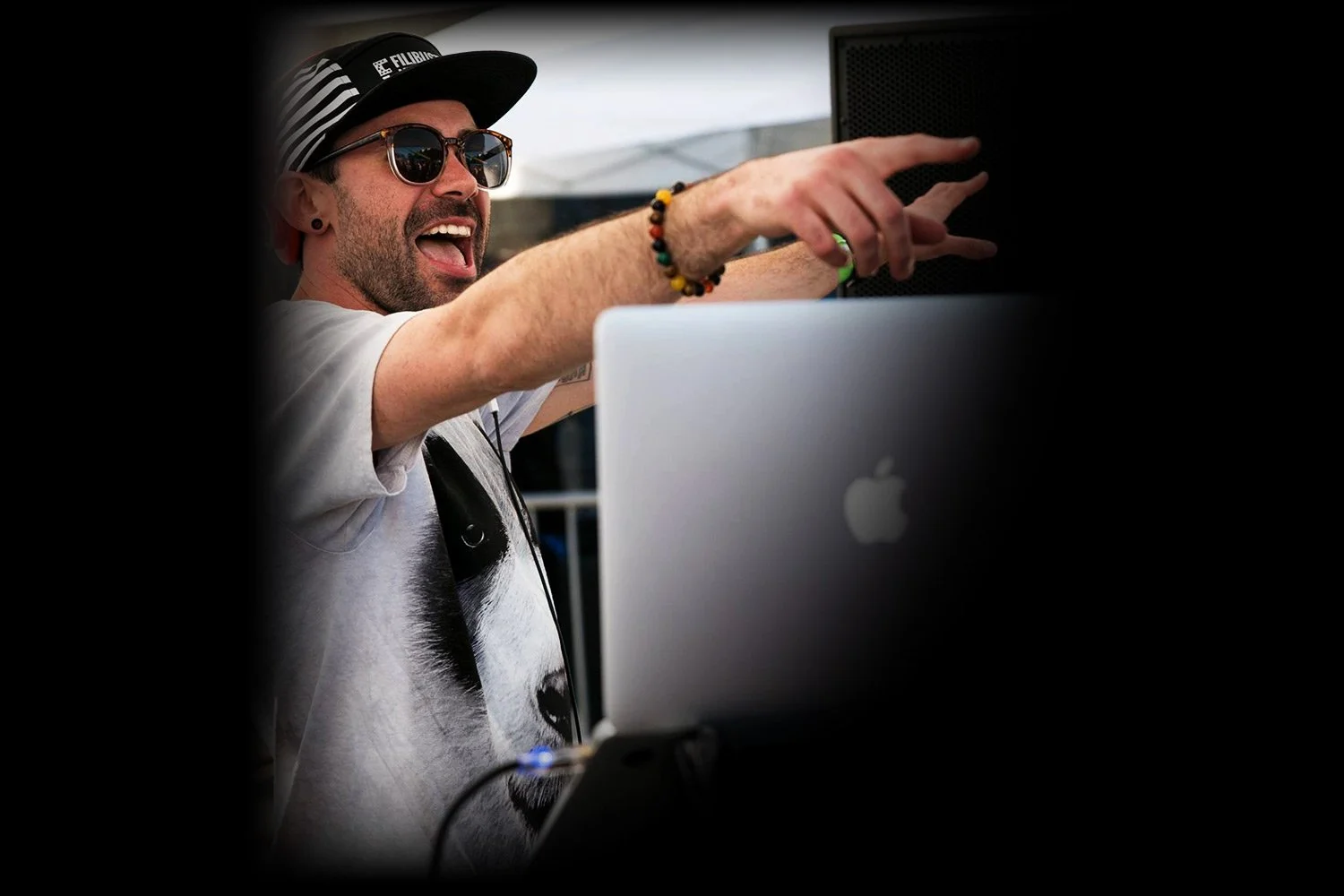 Groove Approved DJ Matty Bomatic performing at a Los Angeles private event with professional DJ equipment and sound system.